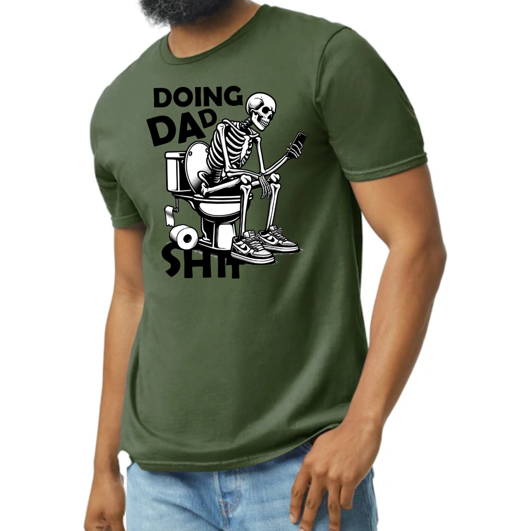 Image of a T-shirt depicting a humorous graphic of a skeleton sitting on a toilet while using a phone. The text ‘Doing Dad Sh*t’ is prominently displayed above the graphic. The T-shirt is shown in four color options: vibrant red, classic gray, bold blue, and fresh green, highlighting its availability for different preferences. A perfect blend of comfort and dad-style humor, suitable for various casual occasions.