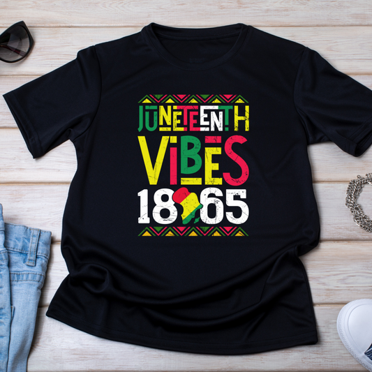 Image of a unisex black t-shirt displaying the design ‘Juneteenth Vibes 1865’ with the silhouette of Africa. The design incorporates the vibrant red, green, and yellow colors symbolizing African American history and the celebration of Juneteenth. This striking tee is ideal for anyone celebrating this important date in history, offering a stylish way to express cultural pride and remembrance.