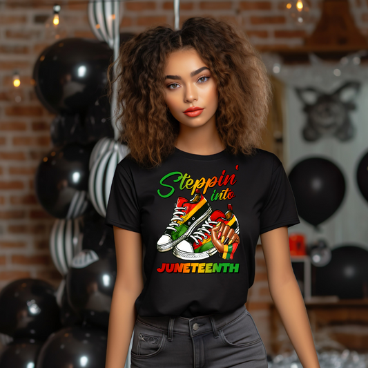 Image of a black t-shirt featuring the phrase ‘Stepping Into Juneteenth’ in vibrant red, green, and yellow colors of the Juneteenth flag, along with a stylish graphic of a pair of sneakers. This design symbolizes moving forward and celebrating the freedom and achievements of African-American history. The t-shirt is designed to offer both comfort and a meaningful message for Juneteenth celebrations or everyday wear.