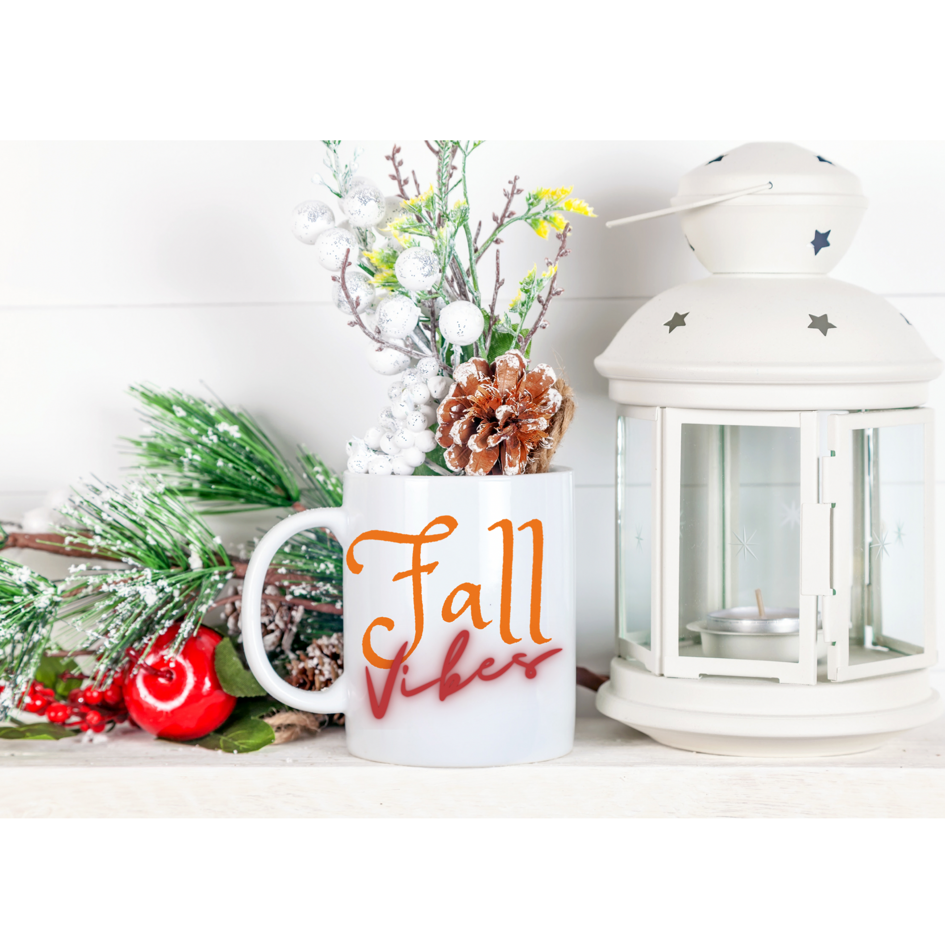 An 11 oz ceramic mug with a “Fall Vibes” design, featuring retro-inspired autumn colors. The mug is filled with a hot beverage and surrounded by fall-themed decor, emphasizing its cozy and seasonal appeal.